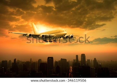 plane flying over urban scene