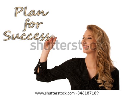 Beautiful young caucasian woman writting in a glass isolated over white