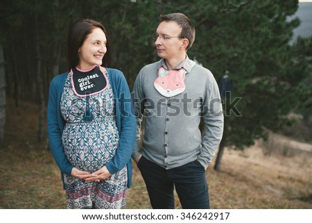 Pregnancy, maternity and  family picture in outdoors, late November