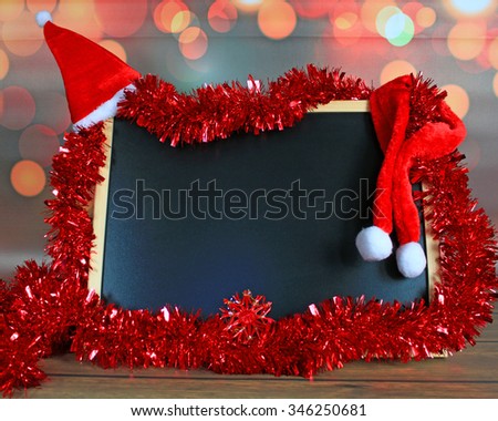 Blackboard With Red Santa Hat And Christmas Decoration. English Text Happy 2016.