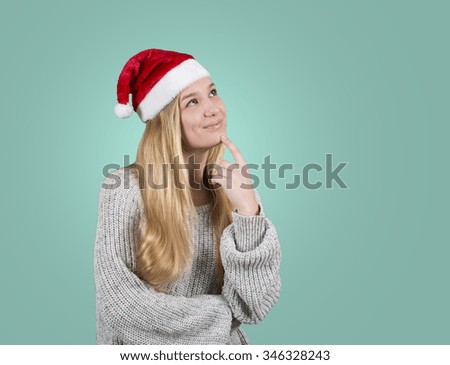 Christmas blond girl looking portrait isolated