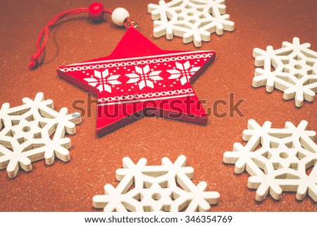 Christmas wooden ornaments toy star with ribbon .