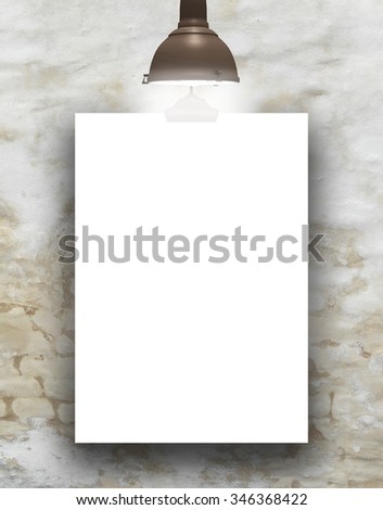 Single hanged paper sheet frame with retro lamp on moulded plastered concrete wall background