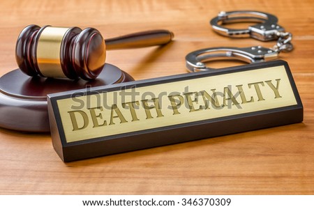 A gavel and a name plate with the engraving Death Penalty Royalty-Free Stock Photo #346370309