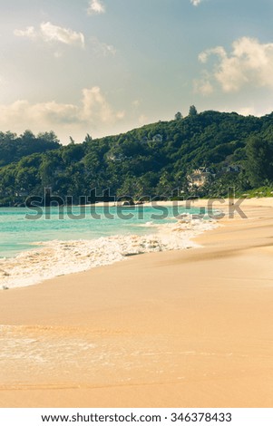 Tropical beach at Mahe island Seychelles in sunny day