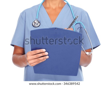 Hands of medical doctor woman writing on clipboard. 