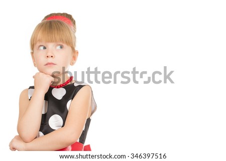 To be considered. Little cutie in a dress looking away thinking isolated on white background