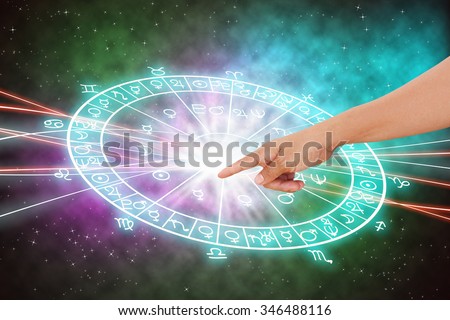 Hand and background of the horoscope concept.