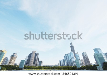 modern city under  blue sky
