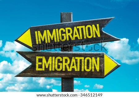 Immigration - Emigration signpost with sky background