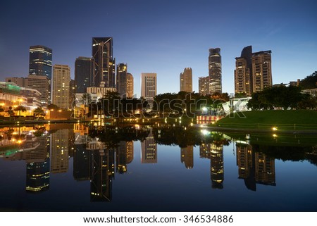 Kuala Lumpur city downtown at before sunrise with reflection of skyline, Kuala Lumpur, Malaysia