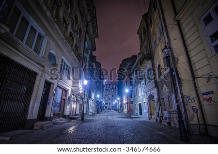 Bucharest, Romania - August 23, 2014: Night street scene in Bucharest old city.
