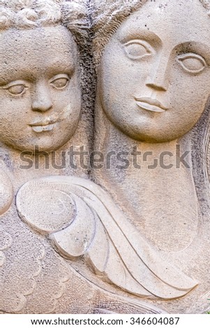 Detail of statue mother and child