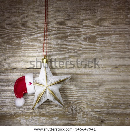 christmas background with cowboy western toys on old wood texture 