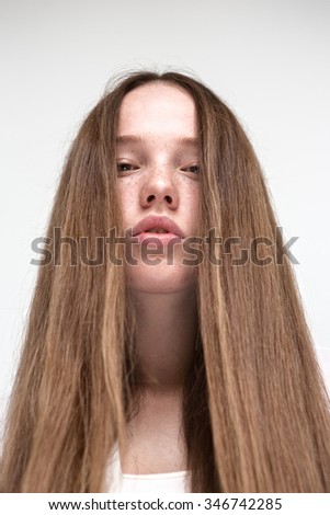 girl with long hair on white background