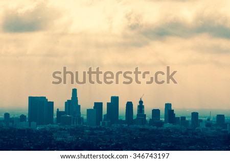 Beautiful Los Angeles skyline silhouette against sunset