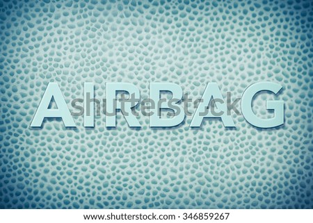 The word airbag written on car interior leather for safety image