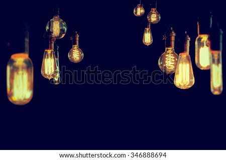 Decorative antique edison style filament light bulbs Royalty-Free Stock Photo #346888694