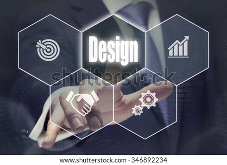 Businessman pressing a Design concept button.