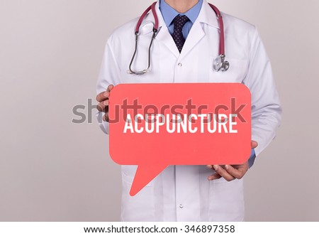 Doctor holding speech bubble with ACUPUNCTURE message