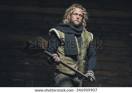 Lumberjack Winter Fashion Man Long Blonde Hair And Beard Holding