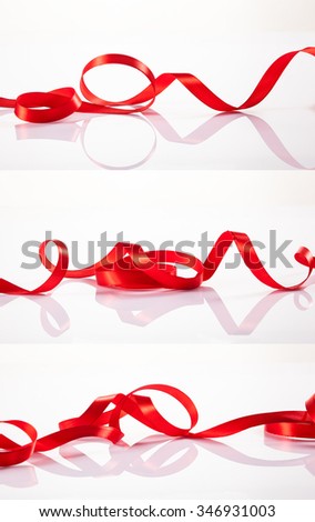 red satin ribbon on a white background