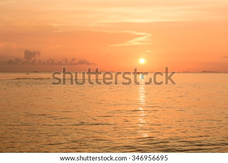 Golden sunset dramatic colorful tropical sea sky and cloud background