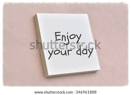 Text enjoy your day on the short note texture background