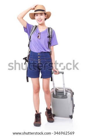Full length of young woman in casual walking with the travel bag on white background