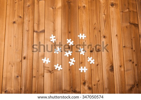 White jigsaw puzzle on the plate