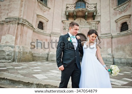 Just married couple background old church
