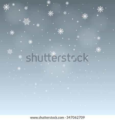 winter background falling snowflakes on blue gray background