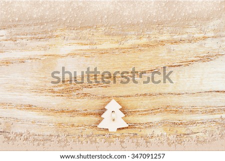 Christmas tree on wooden background