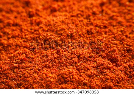 Background of spicy chili powder. Paprika Royalty-Free Stock Photo #347098058