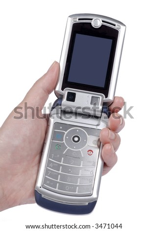 Hand holding old clamshell style flip phone cellphone close up