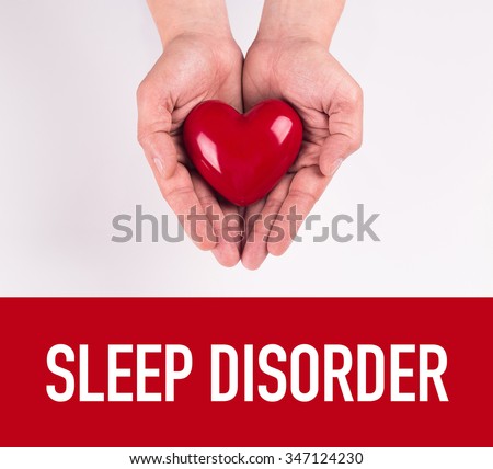 Hand holding heart shape with SLEEP DISORDER text