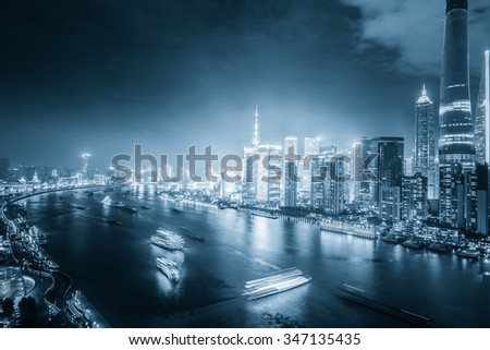 night shanghai skyline with reflection ,beautiful modern city