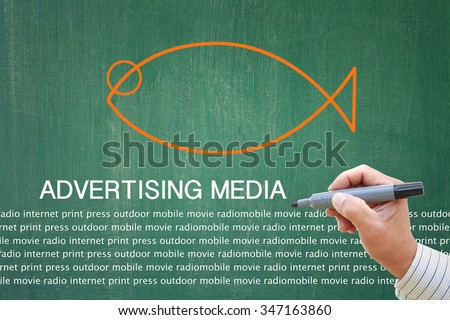 successful businessman making choices on advertising media quiz with magic pen on visual screen board over blue light modern office background