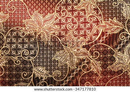 The beautiful of art Malaysian and Indonesian Batik Pattern Royalty-Free Stock Photo #347177810