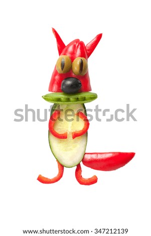 Funny squirrel made of fresh vegetables on isolated background