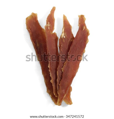 dried meat on white background