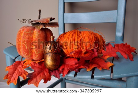 Fall Decorations on a Blue Chair