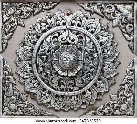 Metal foil handicraft with folk art in temple of Thailand (Wat muensarn; They are public domain or treasure of Buddhism, no restrict in copy or use) Royalty-Free Stock Photo #347328572