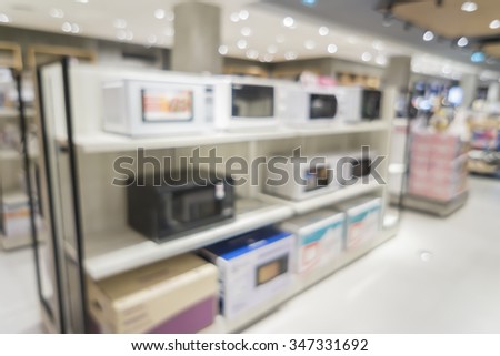 Blur of Electrical appliance stores background.