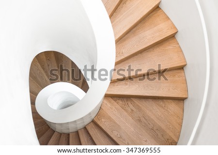 Spiral staircase inside building, Modern spiral staircase, Luxurious interior staircase, Home stair symbol, Modern stairs, Communicating element house Royalty-Free Stock Photo #347369555