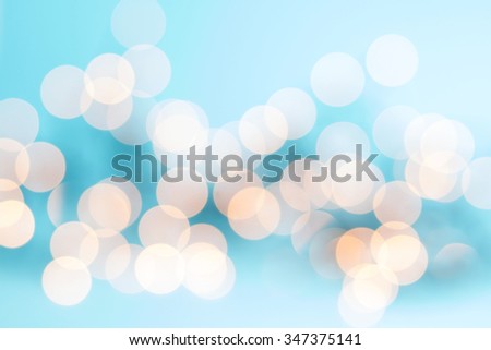 beautiful bokeh made of blurred lights on  blue background