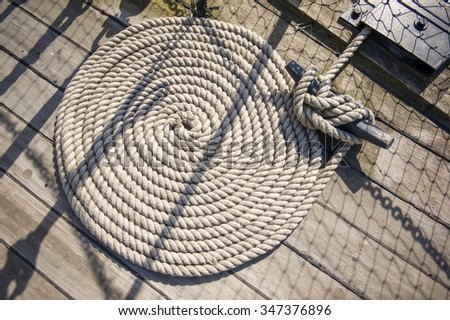 Shipping rope on a ship deck laid in a circle
