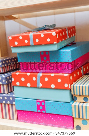 gift boxes with decoration in a circle and stripes