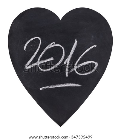 Year 2016 handwritten with a white chalk on a heart-shaped blackboard.