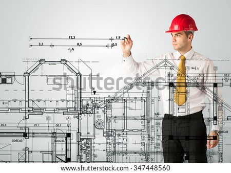 A young architect planning and drawing a family house layout with measurements, lines, numbers, angles